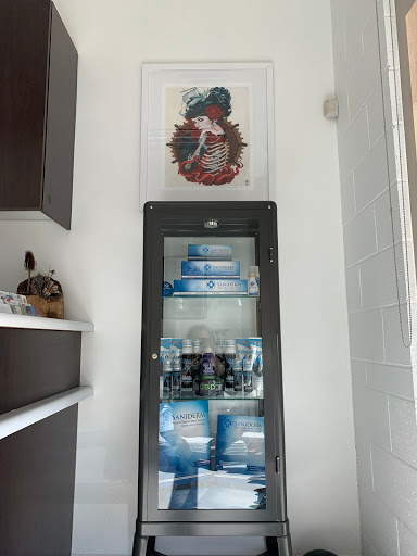 Explore bourbon glass tattoo idea, creative tattoo ideas in Saint George, available at Humble Bee Tattoos (Studios)