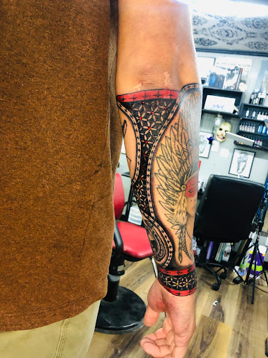 Explore pantera tattoo ideas, creative tattoo ideas in Wasilla, available at Doulos Tattoo, The Tattoo Shop