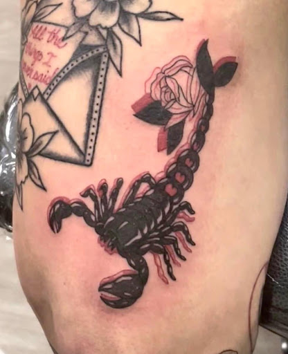 Explore blessed neck tattoo ideas, creative tattoo ideas in Buffalo, available at Vagabond Ink Tattoo Parlor