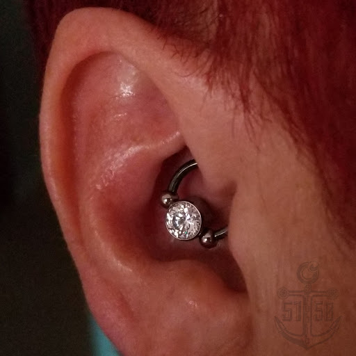 Explore logging tattoo ideas, creative tattoo ideas in Kearney, available at Studio 5150 Piercing & Fine Jewelry