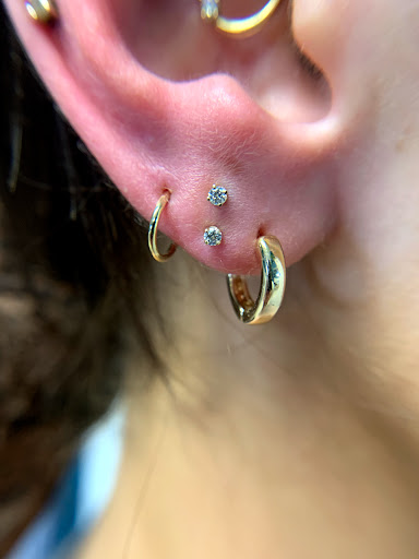 Explore matching tattoo ideas for mom and daughter, creative tattoo ideas in Worcester, available at Elegance Piercing & Tattoo Inc.