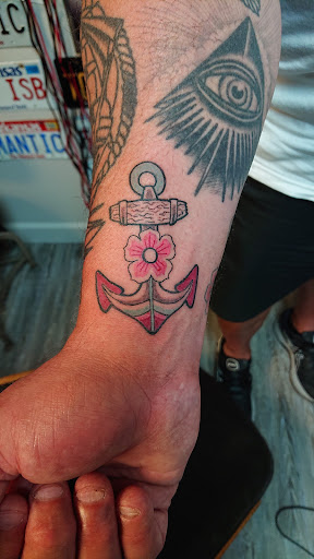 Explore knee scar tattoo ideas, creative tattoo ideas in Jonesboro, available at Immortal Ink