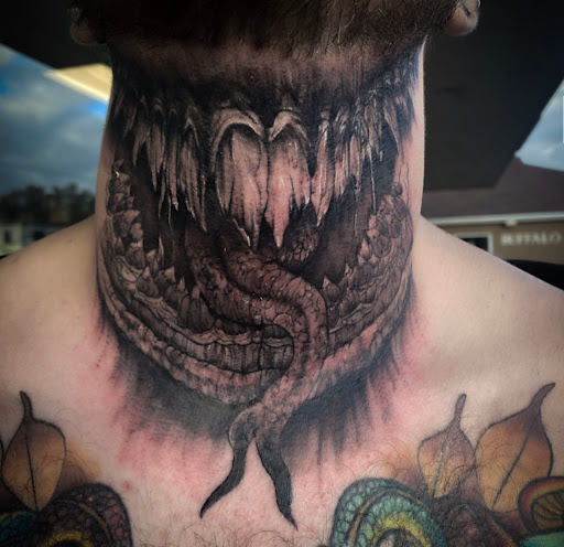 Explore male chest tattoo ideas, creative tattoo ideas in Buffalo, available at True Gloom Tattoo Studio