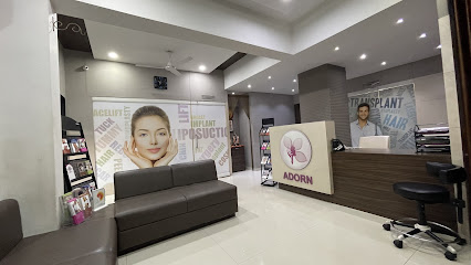 ADORN Cosmetic Clinic - Liposuction Hair Transplant Rhinoplasty Gynecomastia Breast Lift Implant Plastic Surgeon in Ahmedabad