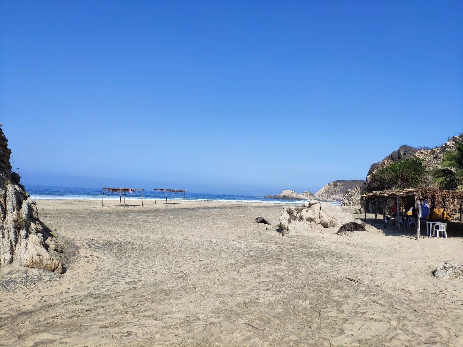 Foto van Playa la Llorona en de nederzetting