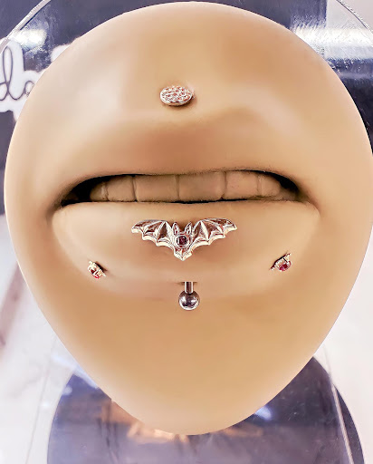 Explore dog outline tattoo ideas, creative tattoo ideas in Chicago, available at Identity Body Piercing