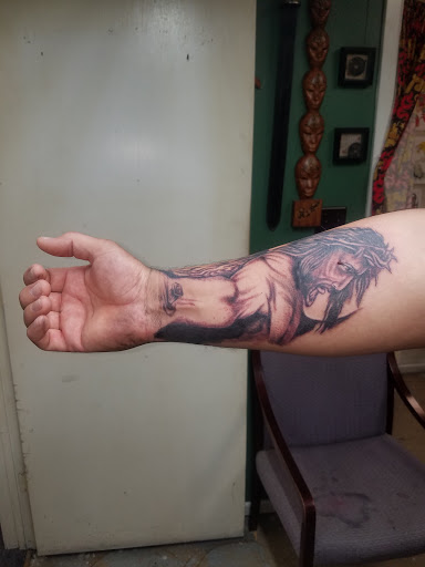 Explore small dinosaur tattoo ideas, creative tattoo ideas in Odessa, available at Little Dragon Tattoos Studio