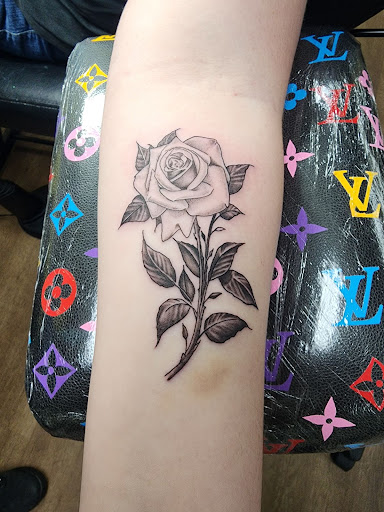 Explore tattoo cover up ideas for women, creative tattoo ideas in Roanoke, available at Black Caesar Tattoos & Piercings