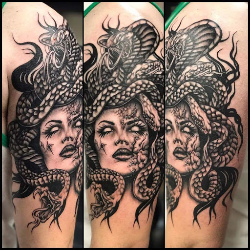 Tattoo Shop «The Lizard Lounge Tattoo Kissimmee», reviews and photos, 4519 S Orange Blossom Trail, Kissimmee, FL 34746, USA