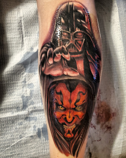 Explore anime leg tattoo ideas, creative tattoo ideas in Buford, available at Inked Arts Tattoo Studio