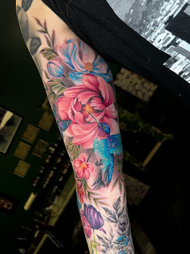Explore skydive tattoo ideas, creative tattoo ideas in Fairmont, available at Heretic Ink