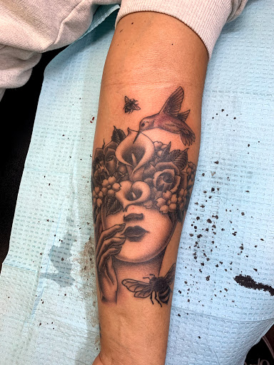 Explore apple tattoo ideas, creative tattoo ideas in Yakima, available at Top Kat Tattoo