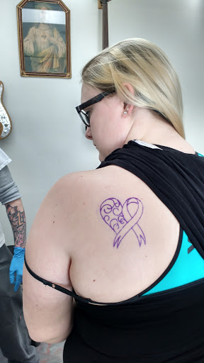 Explore race car tattoo ideas, creative tattoo ideas in Sheboygan Falls, available at Full Throttle Ink LLC