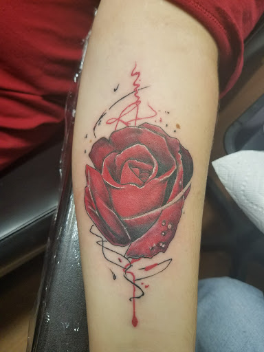 Explore name tattoo ideas for men, creative tattoo ideas in Cambridge, available at Skinworks Tattoo