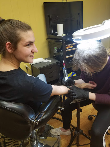 Explore small skull tattoo ideas, creative tattoo ideas in Chattanooga, available at Inked Expressions