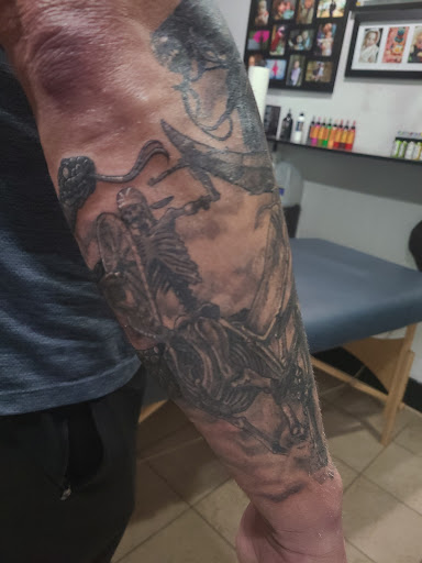 Explore cool thigh tattoo ideas, creative tattoo ideas in Omaha, available at LeVeL UP Tattoo