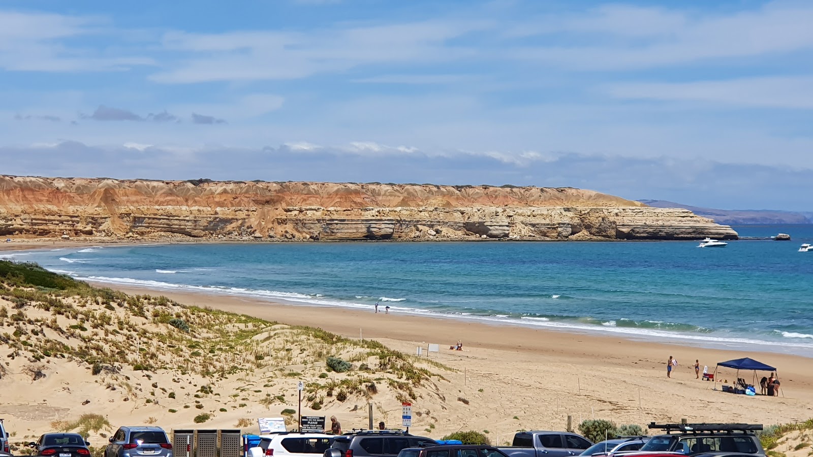 Foto di Maslin Beach con una superficie del sabbia beige