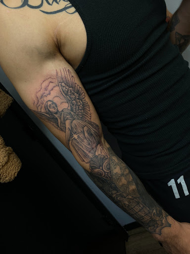 Explore behind neck tattoo ideas, creative tattoo ideas in Idaho Falls, available at Sinner Tattoo Studio