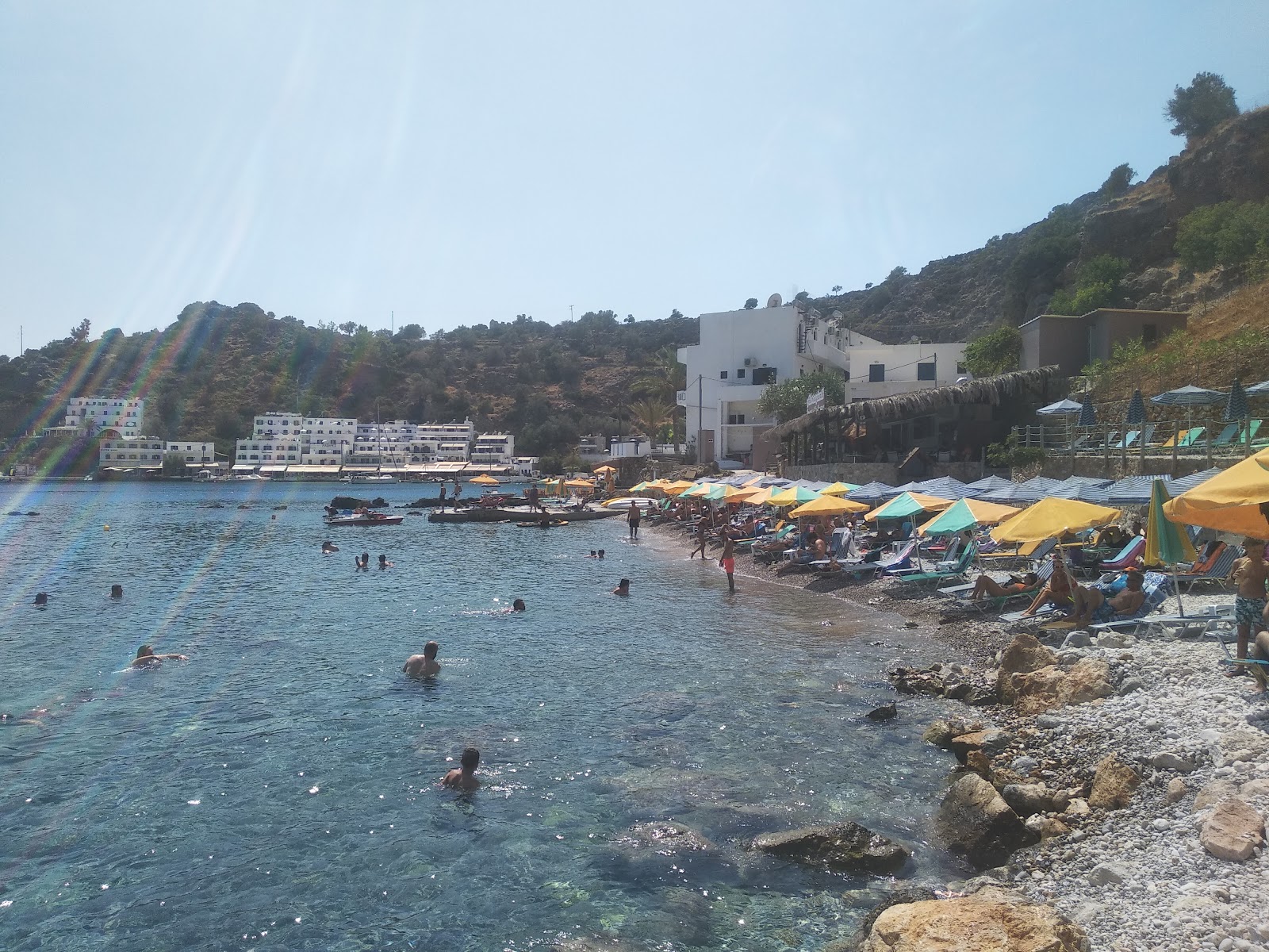 Photo of Loutro beach backed by cliffs