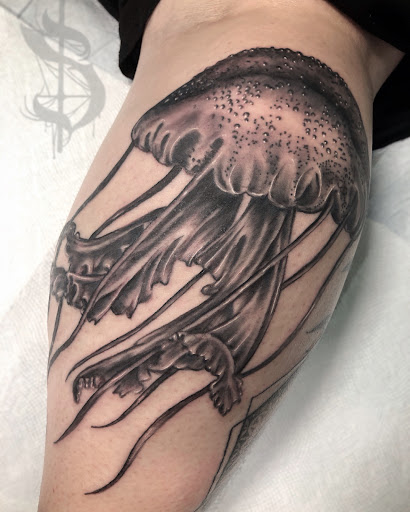 Explore tattoo sleeve filler ideas for men, creative tattoo ideas in Lopez Island, available at Soot and Bone Body Art Studio