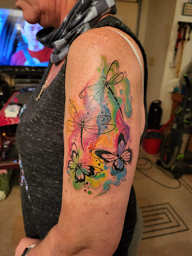 Explore ideas for matching couple tattoos, creative tattoo ideas in Englewood, available at White Eagle Tattoo