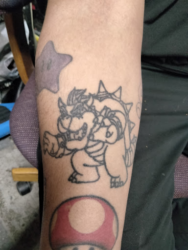 Explore arm tattoo sleeve ideas, creative tattoo ideas in Loganville, available at No Regrets Tattoo Studio