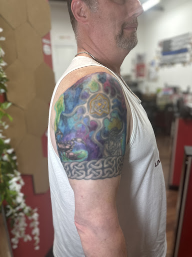 Explore purple rose tattoo ideas, creative tattoo ideas in Randolph, available at Expressive Ink Tattoo