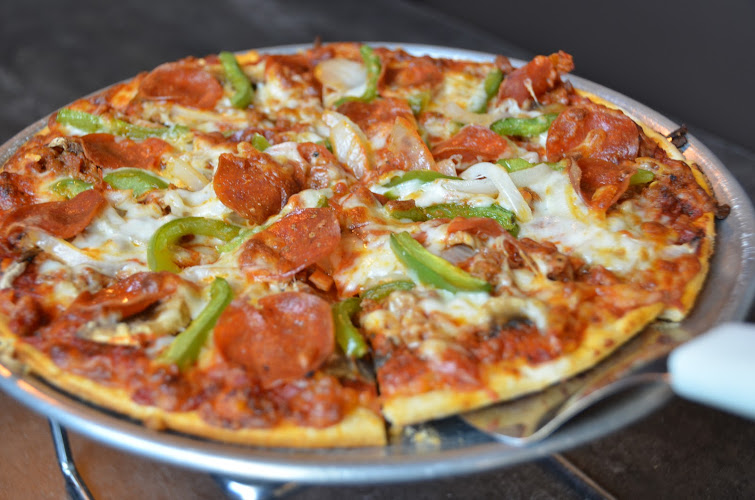 #1 best pizza place in West Des Moines - Coach's Pizza