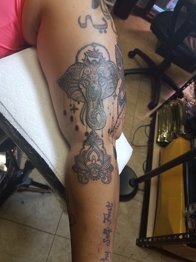 Tattoo Shop «Tattoo Mayhem», reviews and photos, 1510-A Castle Hill Ave, Bronx, NY 10462, USA