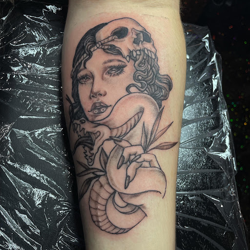 Explore kpop tattoo ideas, creative tattoo ideas in Fort Worth, available at Darkside of Texas Tattoo & Piercing