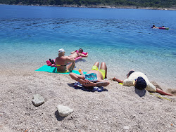Rt Povlja beach'in fotoğrafı düz bir kıyı şeridi ile birlikte