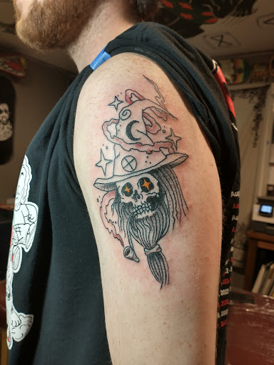 Find in between boob tattoo ideas for your next unique tattoo in Seattle at Good Times Tattoo