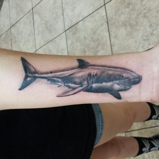 Explore belly tattoo ideas, creative tattoo ideas in San Diego, available at Sideshow Tattoo and Piercing