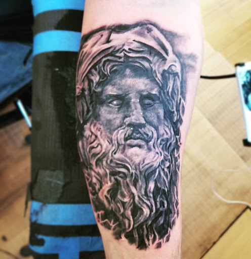 Tattoo Shop «The Shop», reviews and photos, 141 S Grand Ave, Fowlerville, MI 48836, USA