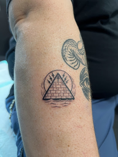 Explore charmander tattoo ideas, creative tattoo ideas in Goose Creek, available at Red Kirin Tattoo