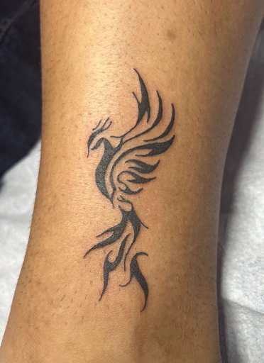 Explore tombstone movie tattoo ideas, creative tattoo ideas in Saint Augustine, available at Ms. Deborahs Fountain of Youth Tattoo & Body Piercing