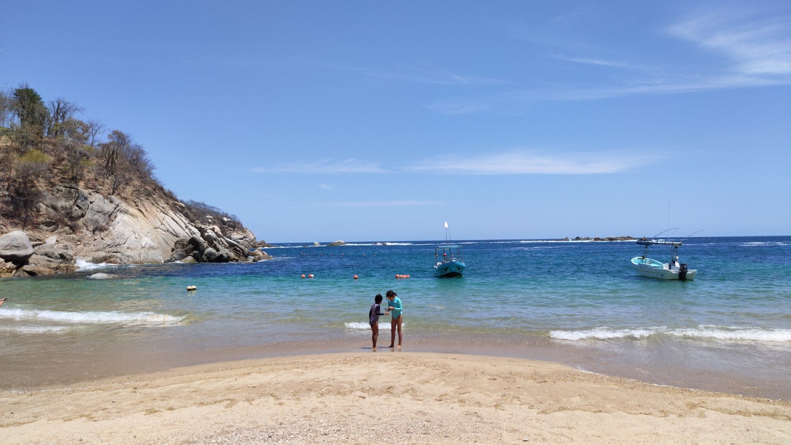 Photo of Arrocito beach with turquoise pure water surface