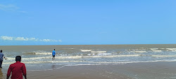 Foto von Kodikkarai Beach und die siedlung