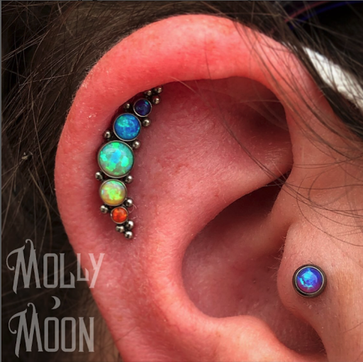 Explore night sky tattoo ideas, creative tattoo ideas in Oshkosh, available at Piercings by Molly Moon at 920 Tattoo and Piercing