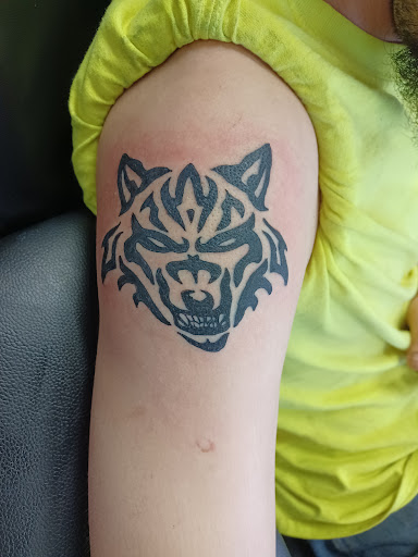 Explore lab tattoo ideas, creative tattoo ideas in Owosso, available at Twisted ink tattoo