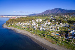 Foto de Playa de Punta Plata com linha costeira longa e reta
