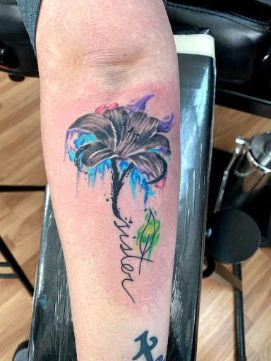 Explore flower tattoo ideas for men, creative tattoo ideas in Watertown, available at Evolution Ink
