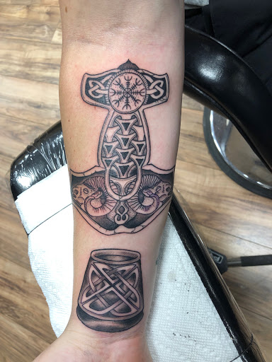 Explore leg tattoo men ideas, creative tattoo ideas in Lees Summit, available at Bleeding Heart Tattoo