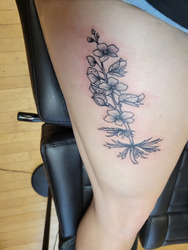 Explore flower leg tattoo ideas, creative tattoo ideas in Wakefield, available at Wakefield Tattoo