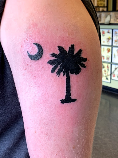 Explore four leaf clover tattoo ideas, creative tattoo ideas in Goose Creek, available at Blu Gorilla Goose Creek