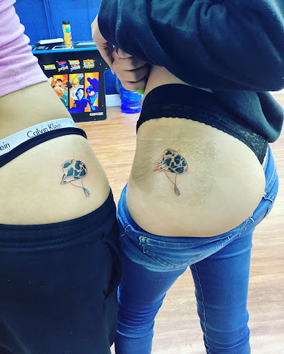 Explore ideas for sibling tattoos, creative tattoo ideas in Cocoa, available at Rorschach Tattoo Shop and Piercing Studio