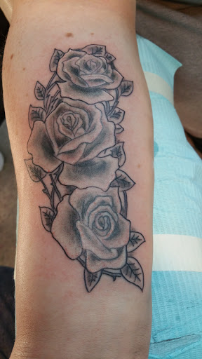 Explore cute ghost tattoo ideas, creative tattoo ideas in Louisville, available at Creative Ink Tattoo Studio