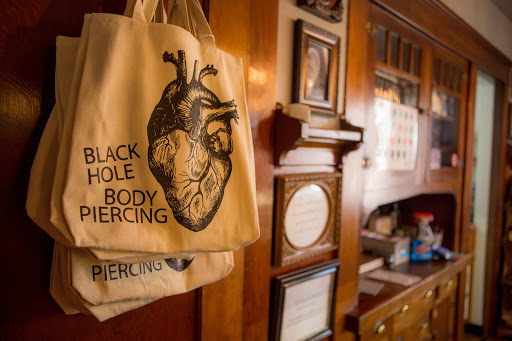 Explore mechanical tattoo sleeve ideas, creative tattoo ideas in Reno, available at Black Hole Body Piercing