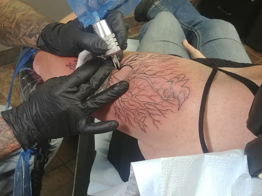Tattoo Shop «Evolution Tattoo», reviews and photos, 9425 Syndicate Ave, Bloomington, MN 55420, USA