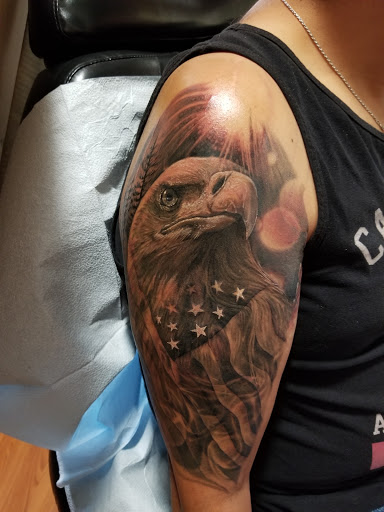 Explore feminine sleeve tattoo ideas, creative tattoo ideas in Pueblo, available at Spellbound Electric Tattoos